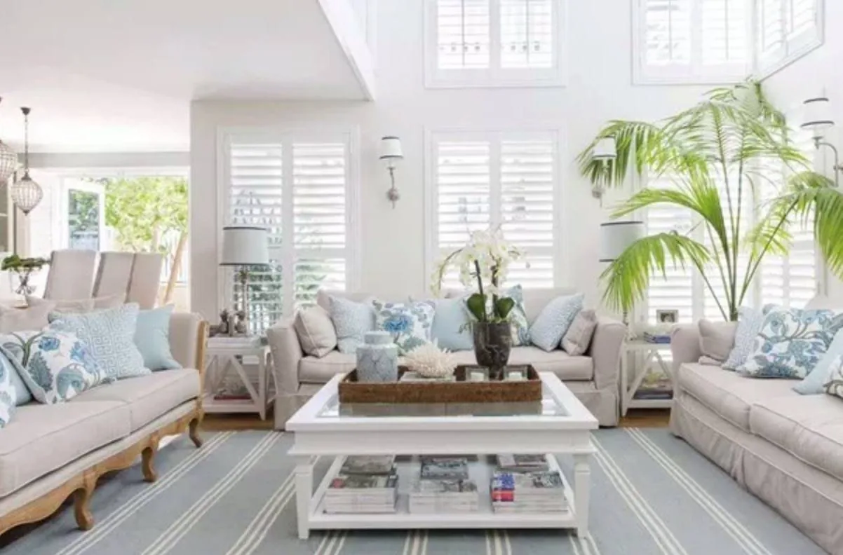 Lined curtains covering a wide living room window