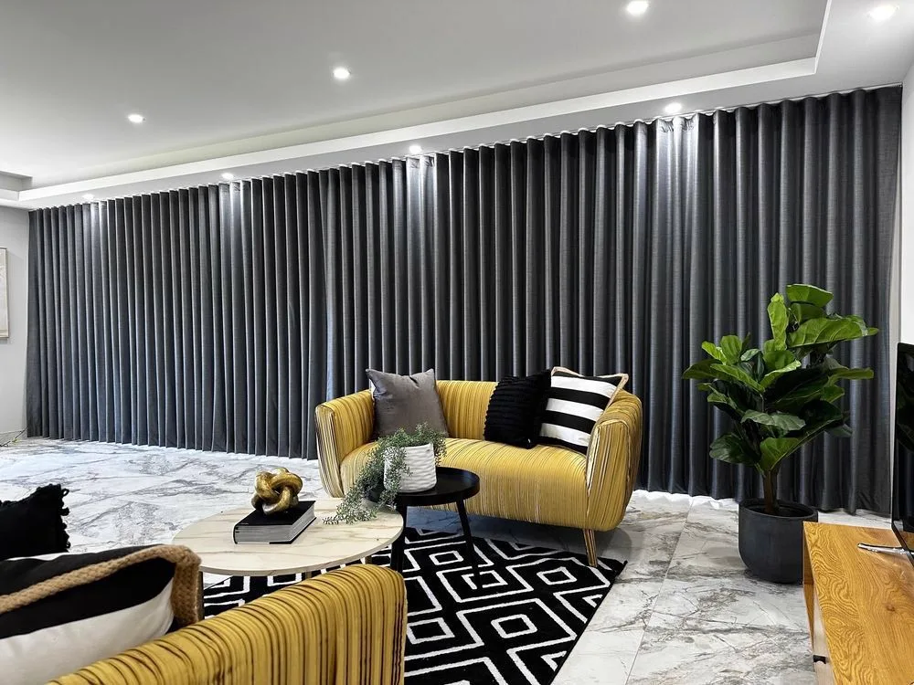 Dark blockout curtains in a living room — blockout curtains in Brisbane